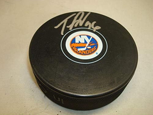 Taylor Beck assinou o hóquei do New York Islanders Puck autografado 1b - Pucks autografados da NHL