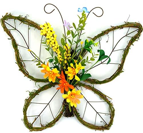 Greante de borboleta idílica com bagas pastel e grinaldas artificiais da primavera floral para decoração da porta da frente
