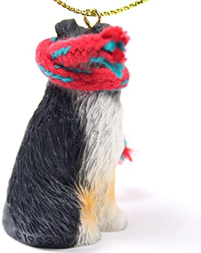 Conceitos de conversa Shetland Sheepdog minúsculo em miniatura Um ornamento de Natal tricolor - delicioso!
